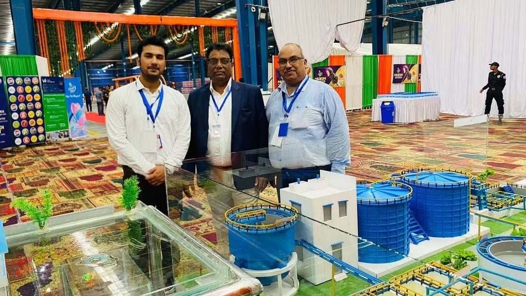 AEEC team with STP plant model exhibit